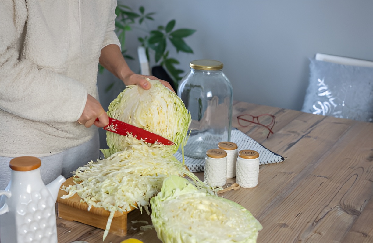 woman chopping cabbage